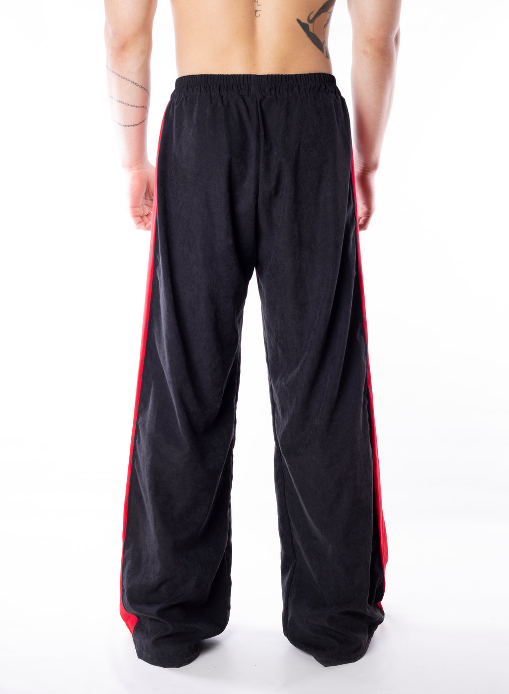 Track Pants With Red Lines