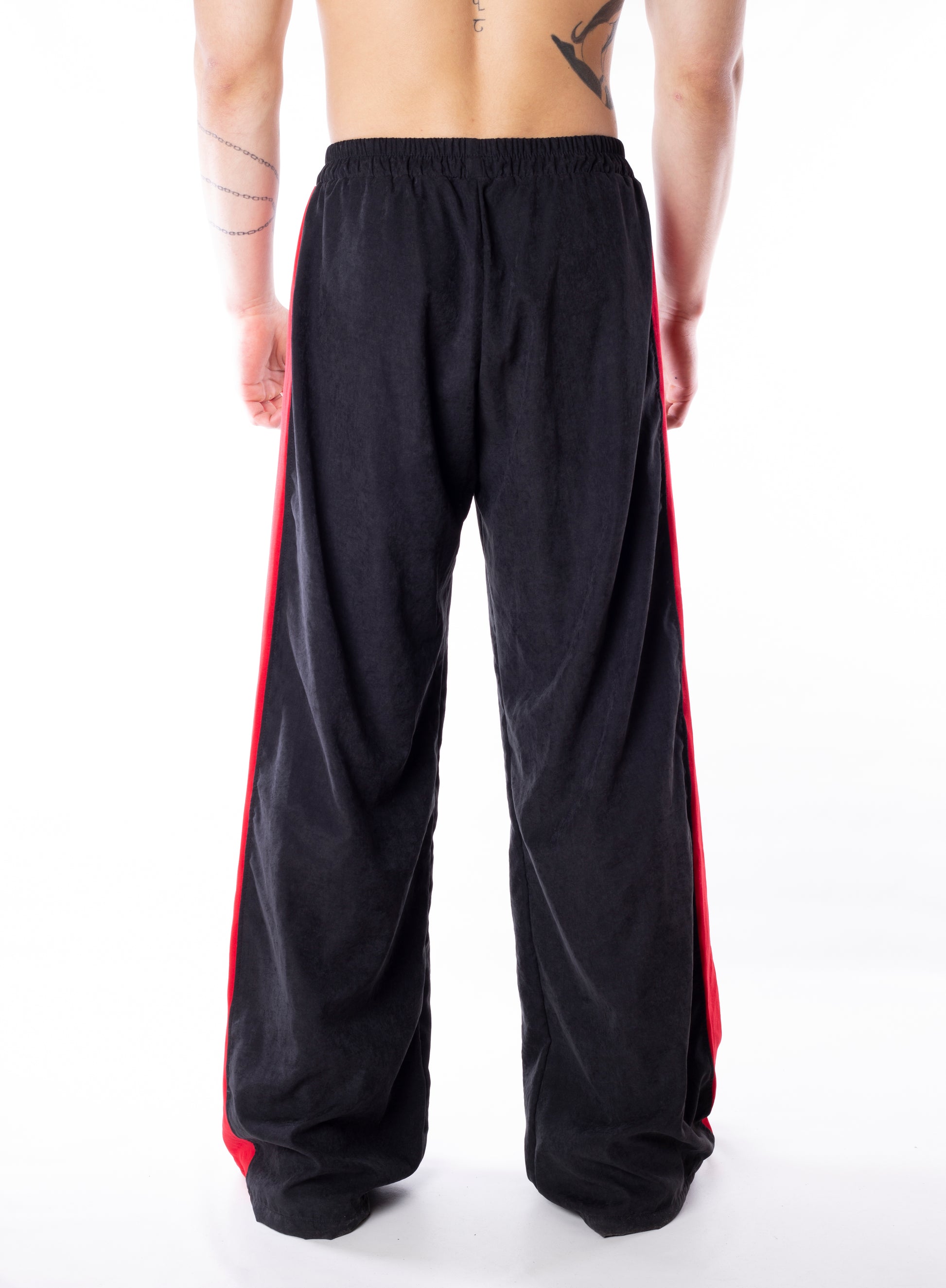Track Pants With Red Lines