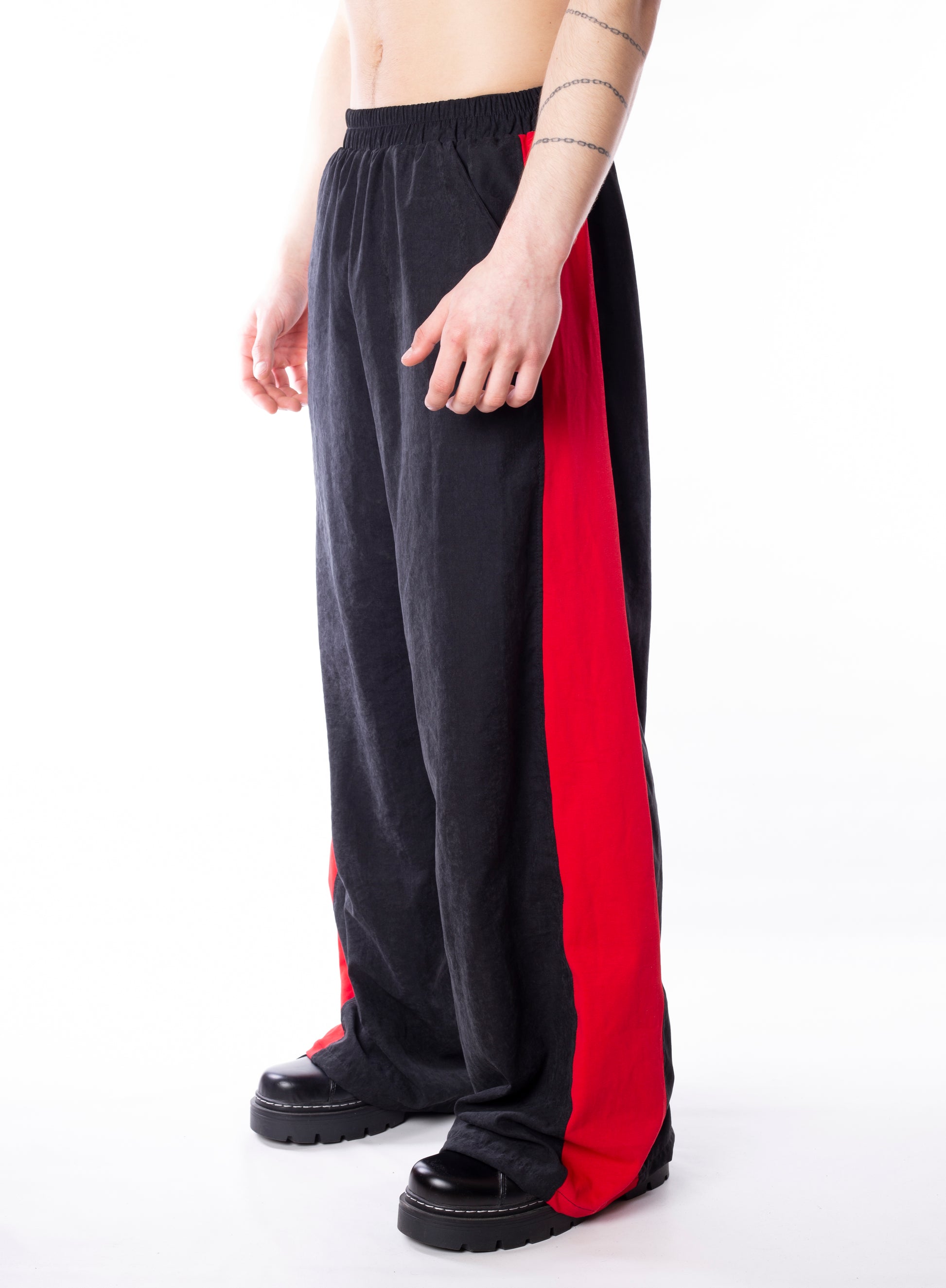 Track Pants With Red Lines