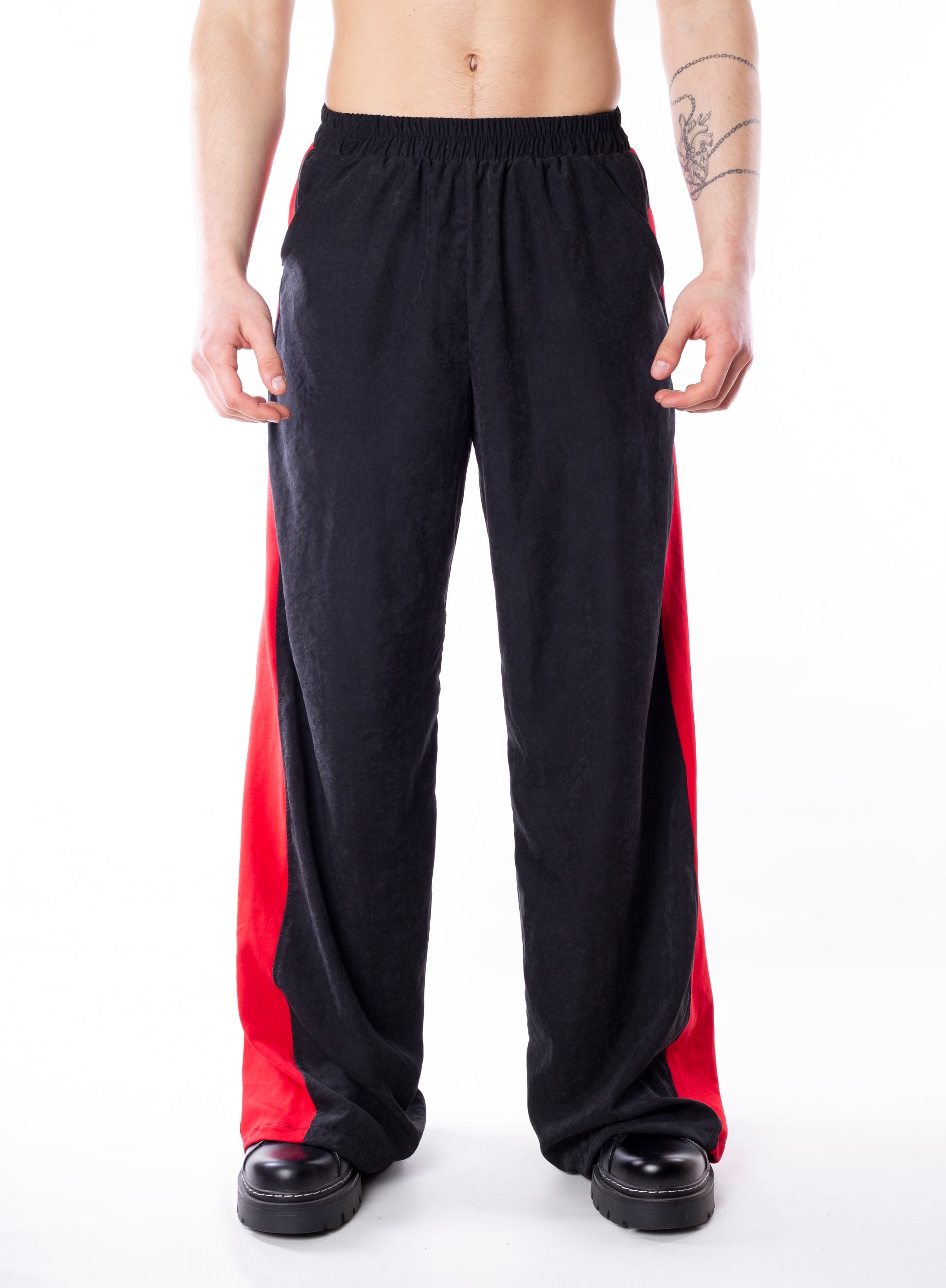 Track Pants With Red Lines